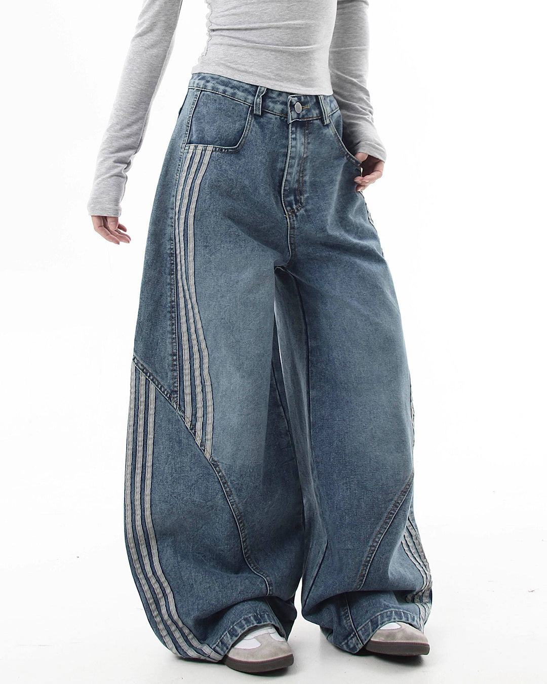 STRIPED PATCHWORK CURVED LEG JEANS - BLUE