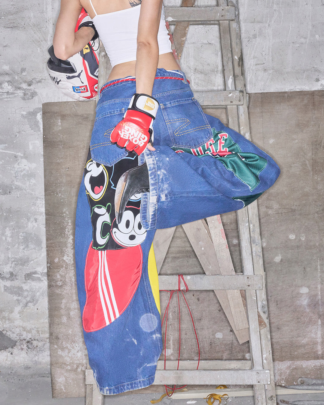 GRAFFITI PATCHWORK CURVED LEG JEANS - BLUE